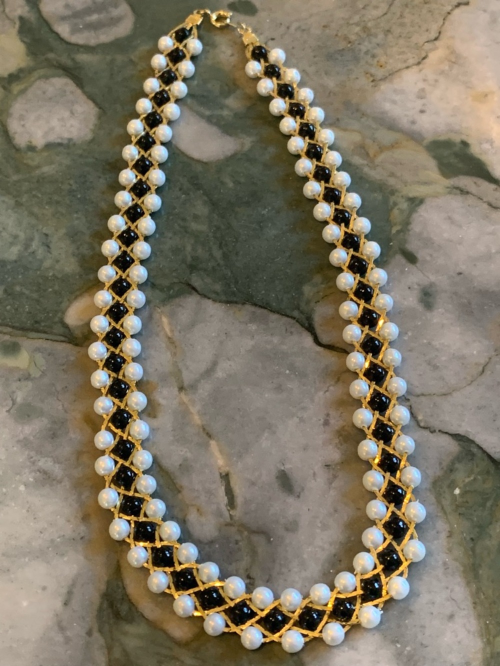 Elegant Black and White Pearl-Accented Necklace